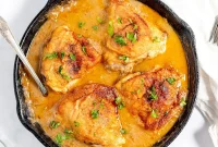 Skillet Smothered Chicken Thighs Recipe with Savory Gravy