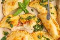 Caprese Empanadas with Tomato Mozzarella and Basil