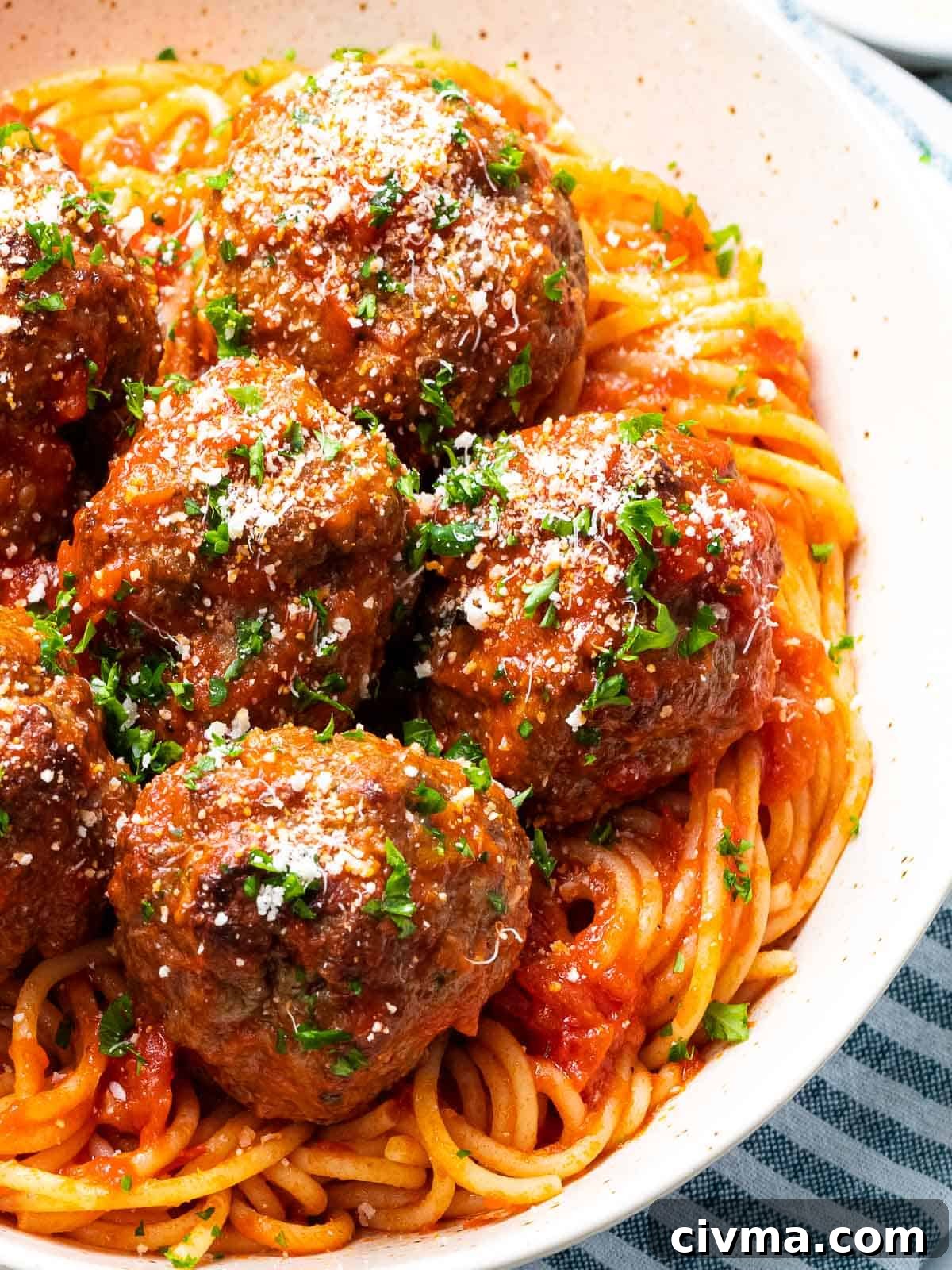 Juicy, melt in your mouth Italian meatballs with spaghetti.