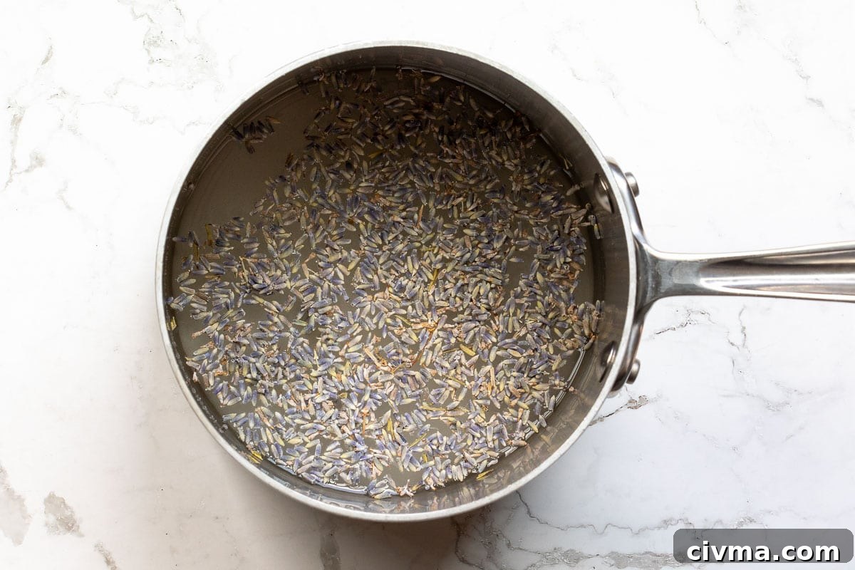 lavender buds, sugar, and water in saucepan.