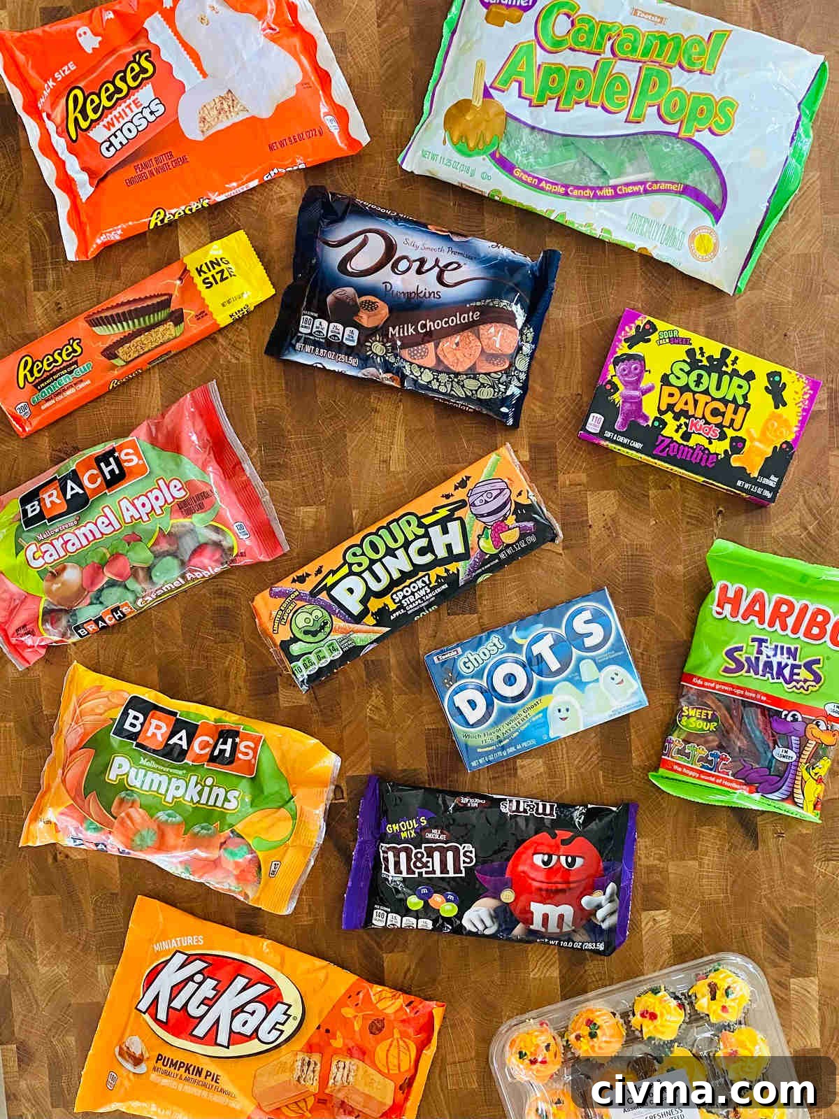 Halloween Charcuterie Board Ideas for a Spooky Party 5 bags of candy used to make halloween charcuterie board