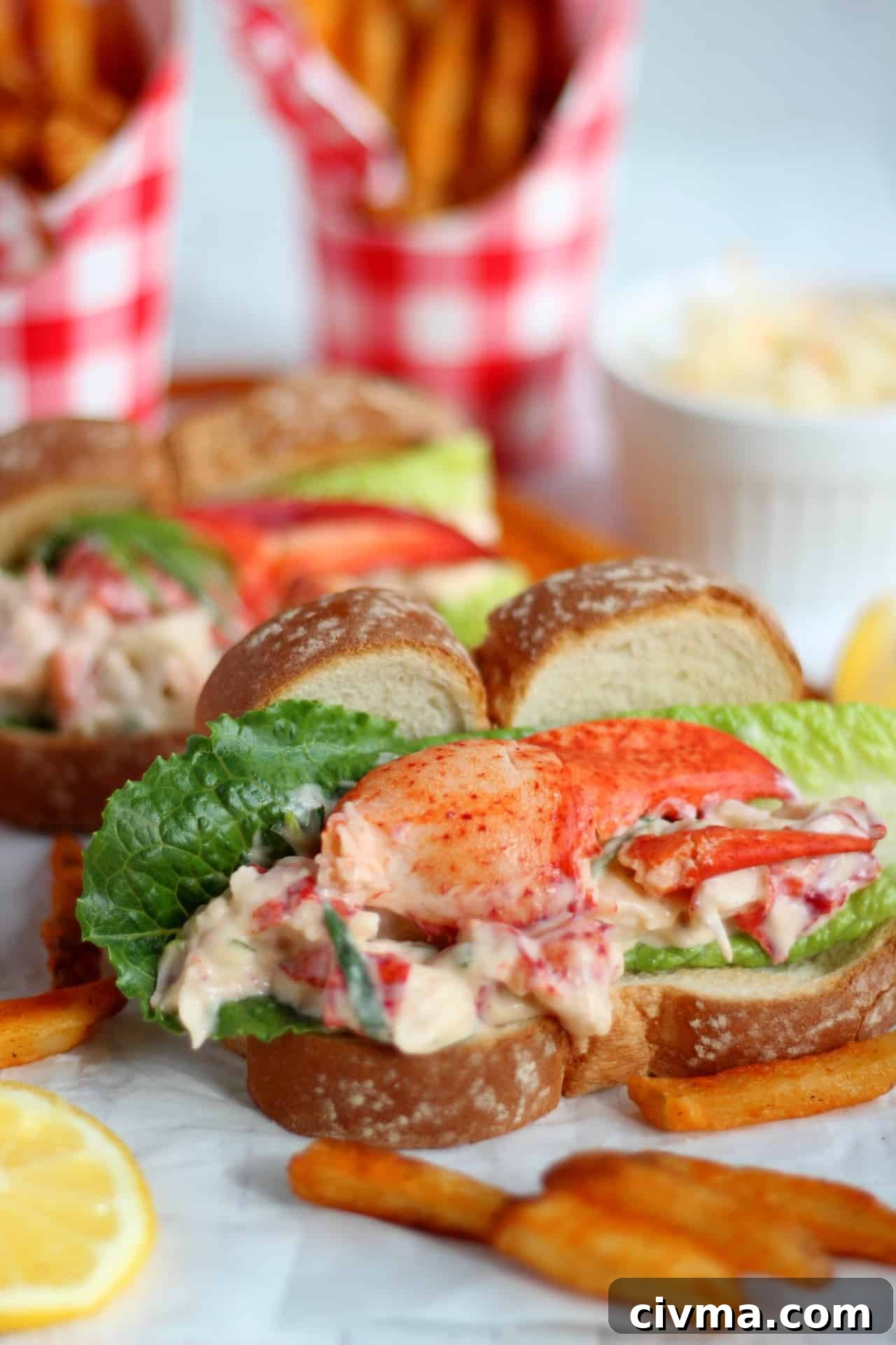 close up of lobster mixture in hot dog bun
