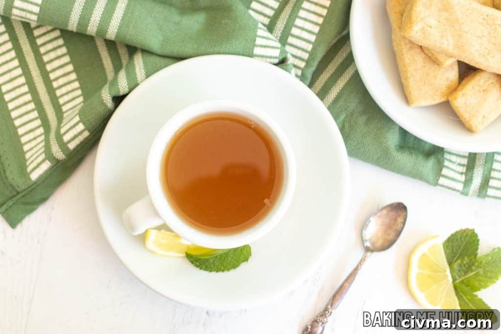 honey citrus mint tea recipe from overhead next to plate of shortbread