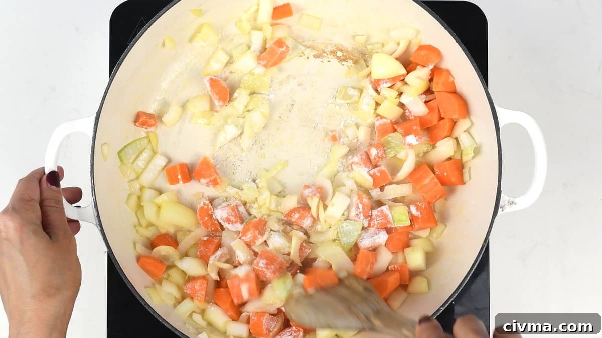 Adding flour to the vegetables