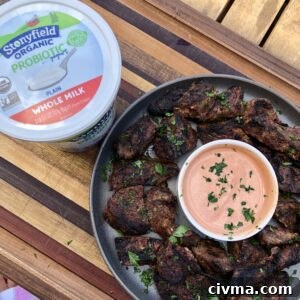 Yogurt marinated grilled steak tips served with spicy yogurt dipping sauce