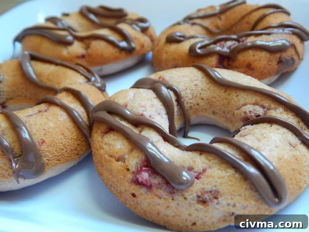 Strawberry Nutella donuts on a plate