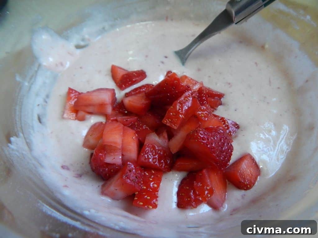 Baked strawberry donuts before topping