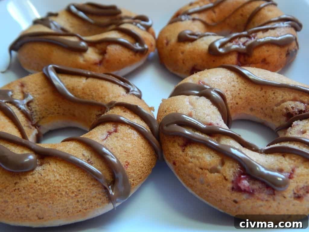 Strawberry donuts with Nutella drizzle