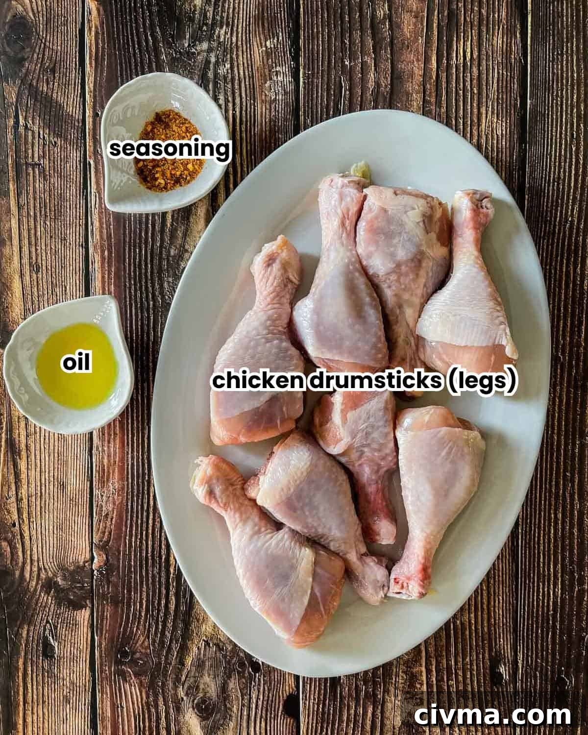 Ingredients for instant pot chicken drumsticks placed on a wooden table.