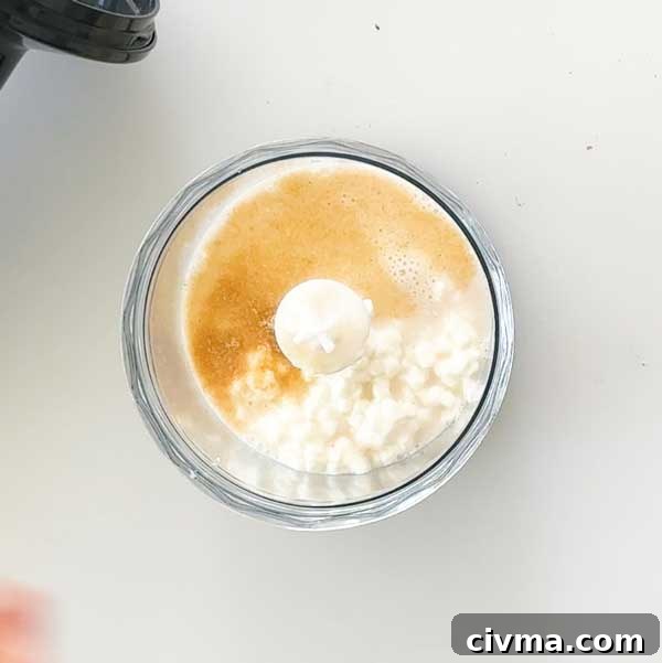 Creamy Garlic Cottage Cheese Mashed Potatoes 11 Adding the cottage cheese and wet ingredients to a chopper cup to blend smoothly.