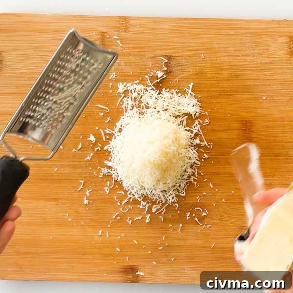 Creamy Garlic Cottage Cheese Mashed Potatoes 8 Finely shredded parmesan cheese on a cutting board.
