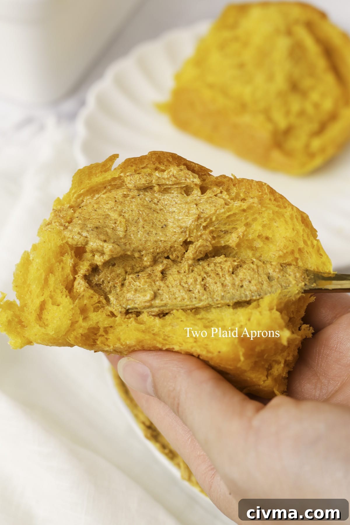 Soft Pumpkin Dinner Rolls Recipe 4 Pumpkin dinner rolls pulled apart.
