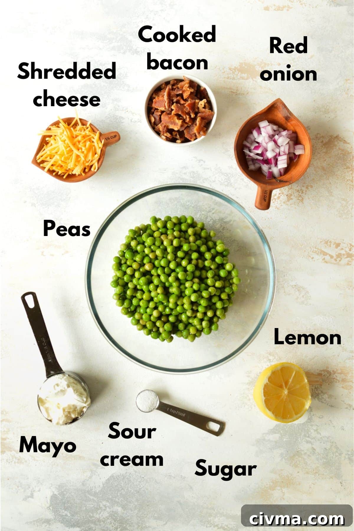 peas, cheese, bacon, red onion, mayo, sour cream, sugar