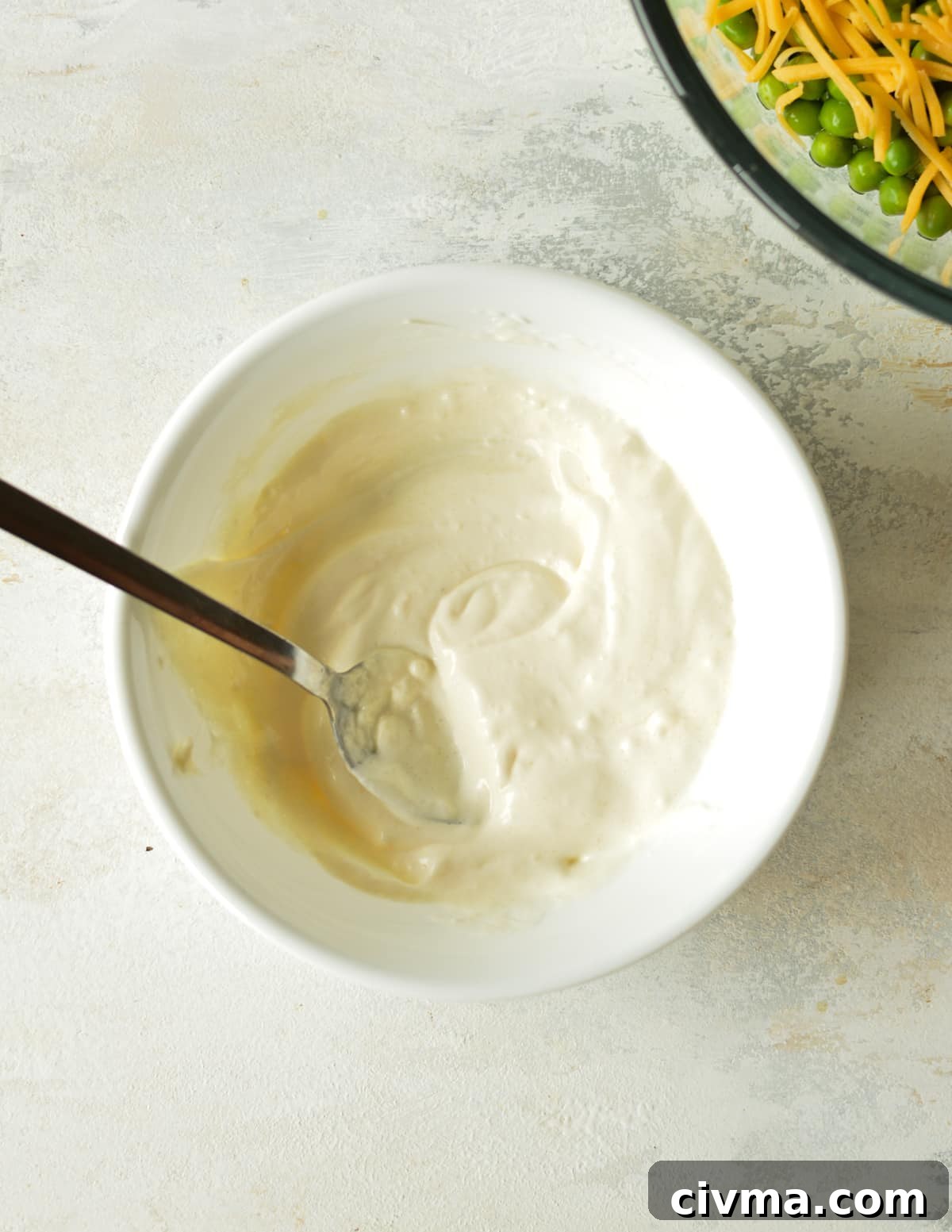 a small bowl of mayo-based dressing