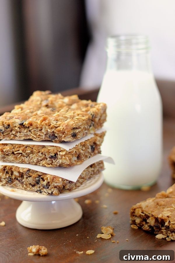 Brown Butter Oatmeal Currant Cookie Bars in a stack of three.