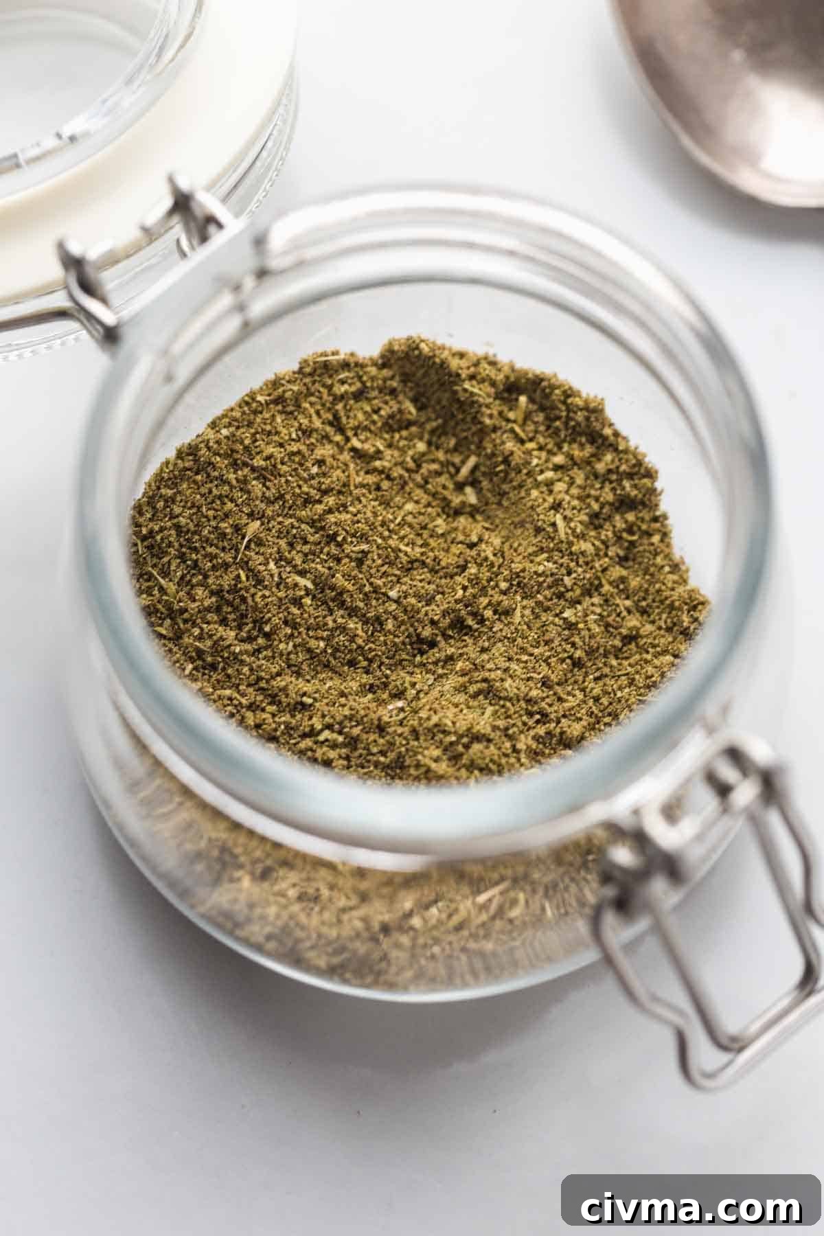 Ground Poultry Seasoning stored in a glass jar
