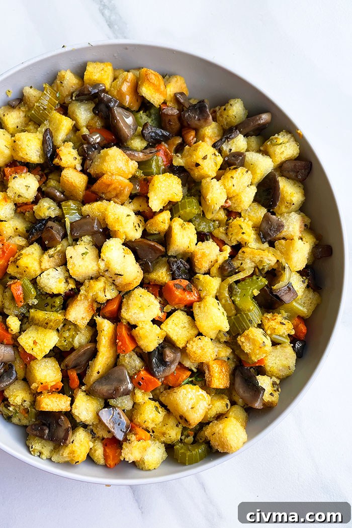 Instant Pot Vegetarian Stuffing Recipe 2 Easy Homemade Instant Pot Vegetarian Stuffing Served in Gray Bowl on White Background- Overhead Shot