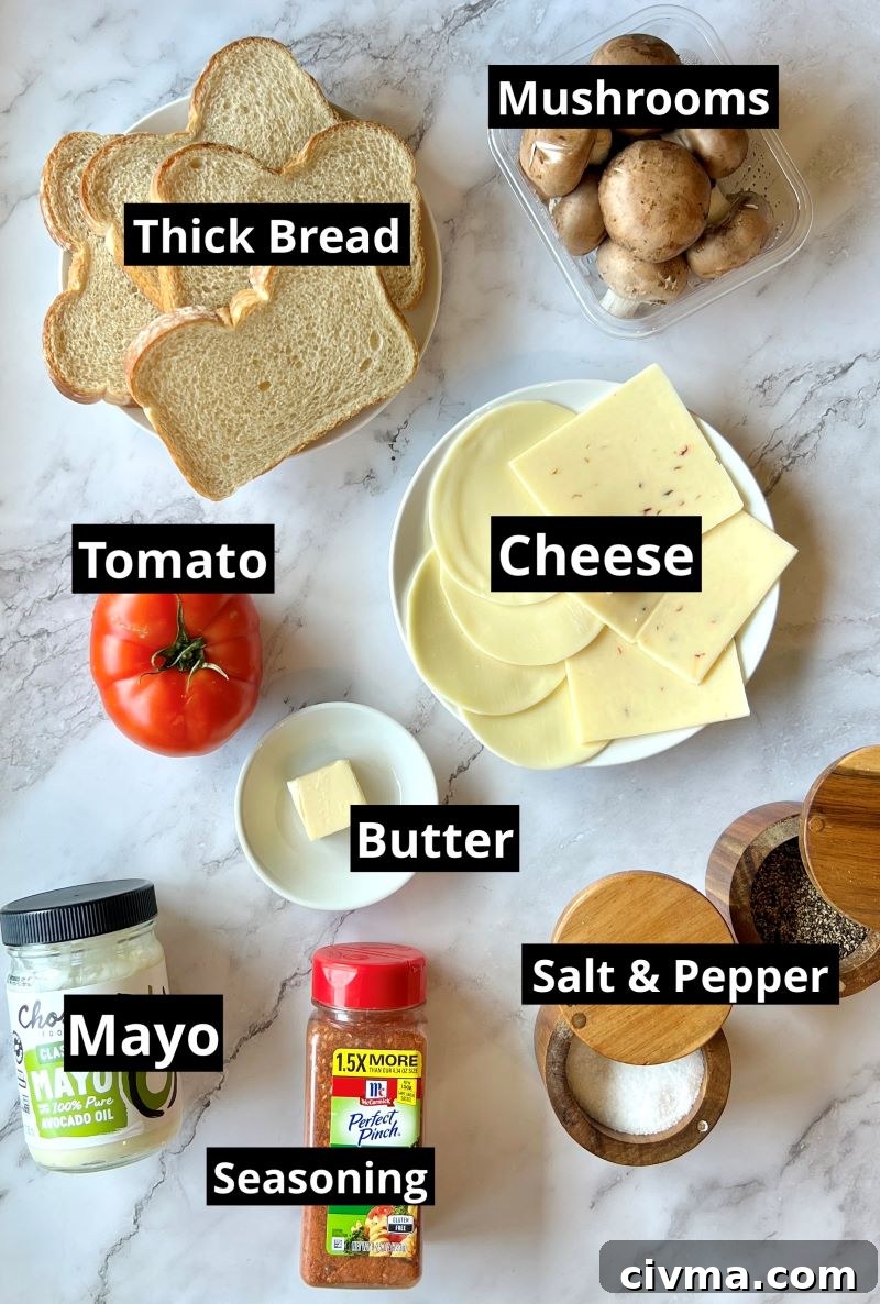 Ingredients for mushroom grilled cheese sandwich. Bread, mushrooms, cheese, tomato, seasonings, butter, mayo, salt and pepper. 