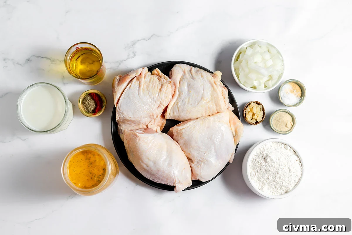 Ingredients to make Smothered Chicken Thighs set out on the counter.