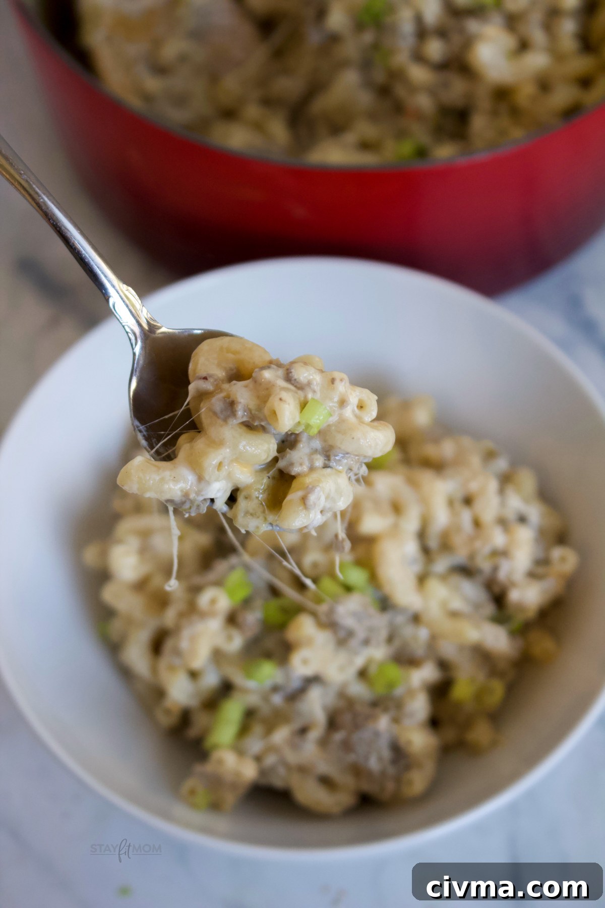 Creamy Hatch Green Chile Mac & Cheese with pasta, ground beef, and cheese