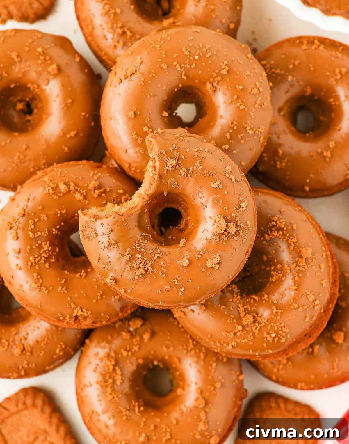 Biscoff Cookie Butter Donuts with Creamy Glaze 7 Stack of donuts seen from above.