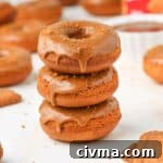 Biscoff Cookie Butter Donuts with Creamy Glaze 9 Stack of three donuts.
