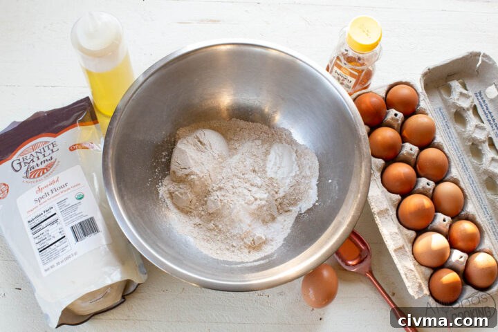 ingredients for healthy pancakes: egg, whole wheat flour, milk, honey, oil, salt, and baking powder