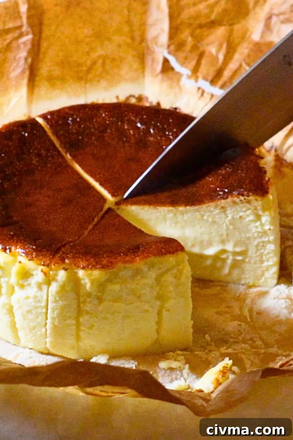 Basque Burnt Cheesecake Recipe 2 slicing a gluten-free Basque cheesecake