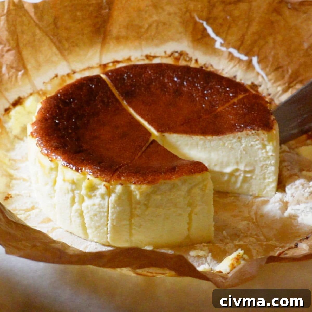 Basque Burnt Cheesecake Recipe 11 slicing a gluten-free Basque cheesecake