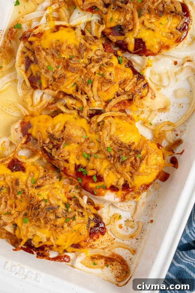 Chicken breast covered in barbecue sauce, melted cheese, and crispy fried onions.