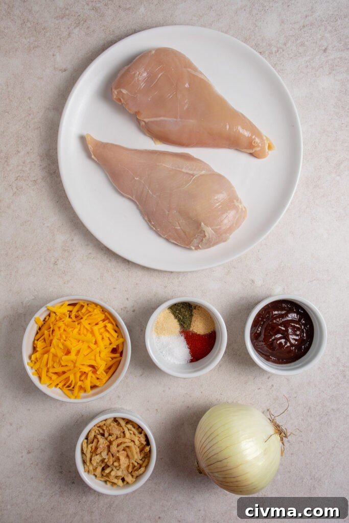 Ingredients for making cheesy BBQ chicken bake on a tabletop.