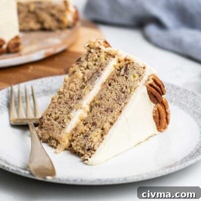 A slice of hummingbird cake on a dessert plate.