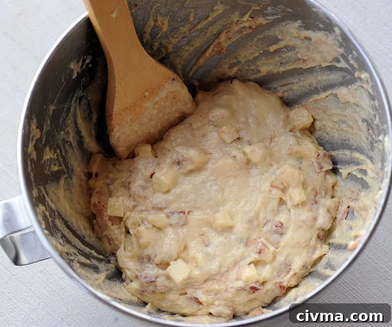 bacon apple fritter batter in metal bowl