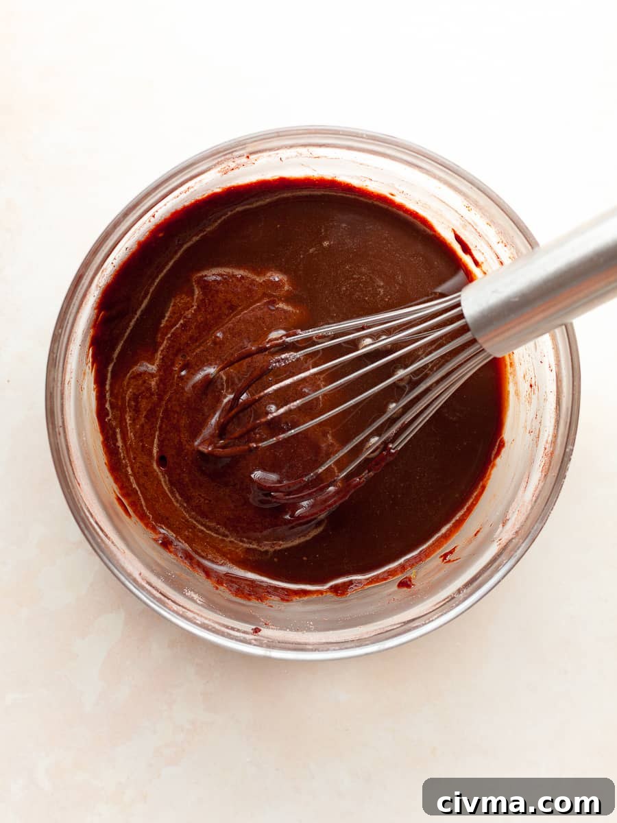 Gluten Free Air Fryer Chocolate Cake Recipe 8 hot coffee being mixed into chocolate cake batter