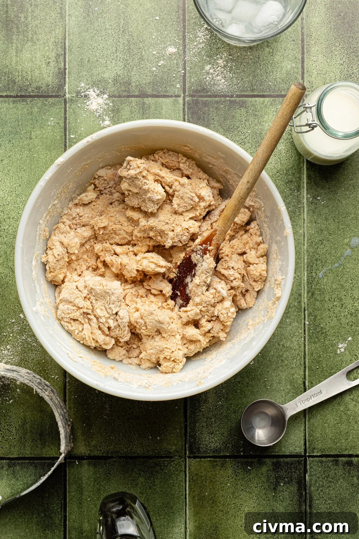 Apple Pie Recipe with Less Sugar and Flaky Crust 6 Dough being mixed for apple pie in a bowl.