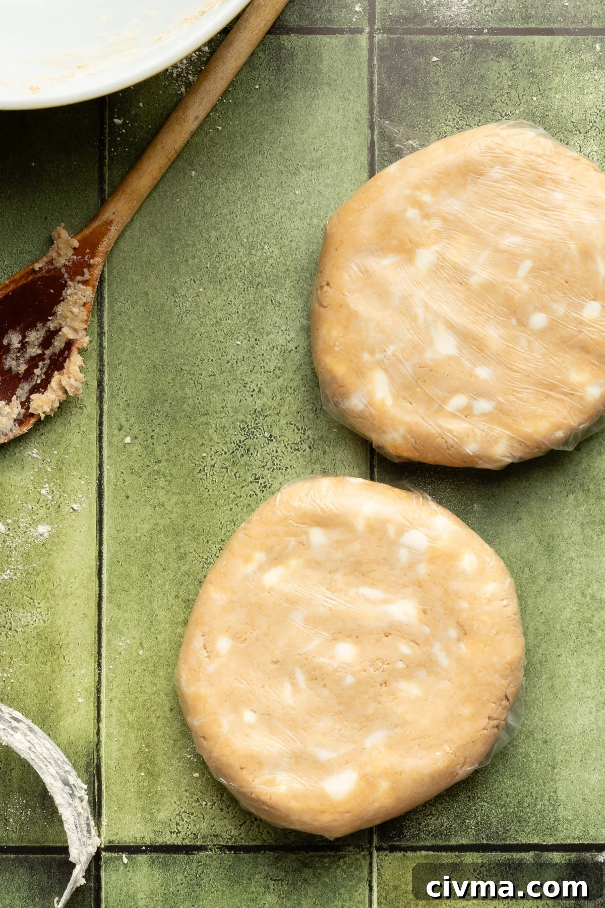 Apple Pie Recipe with Less Sugar and Flaky Crust 7 Two whole wheat pie crust doughs shaped into disks.