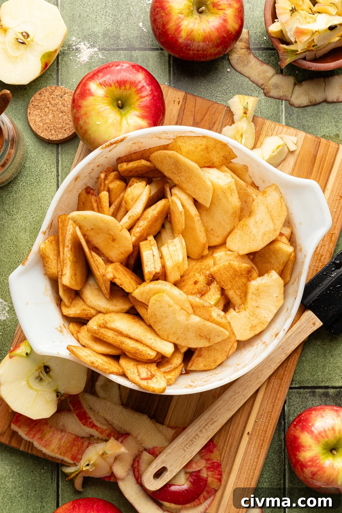 Apple Pie Recipe with Less Sugar and Flaky Crust 8 Healthy apple pie filling in a large bowl.