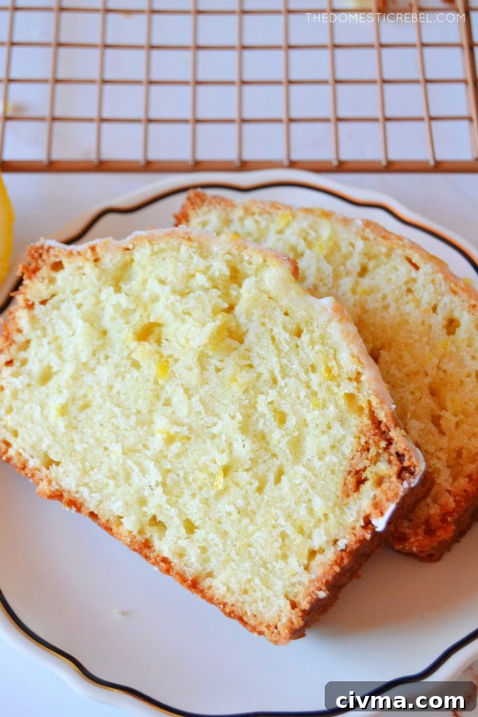 two slices of lemon loaf on a white plate