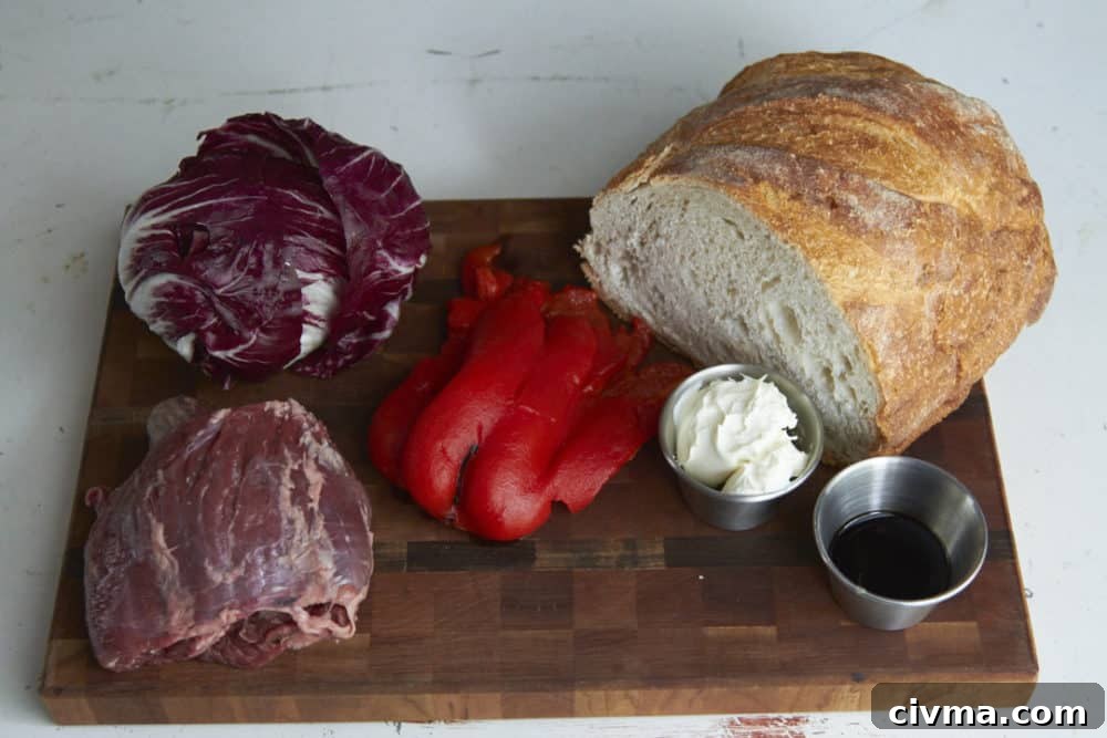 Raw steak, a head of radicchio, roasted red peppers, half a loaf of bread, and two small ramekins of mascarpone and balsamic vinegar.
