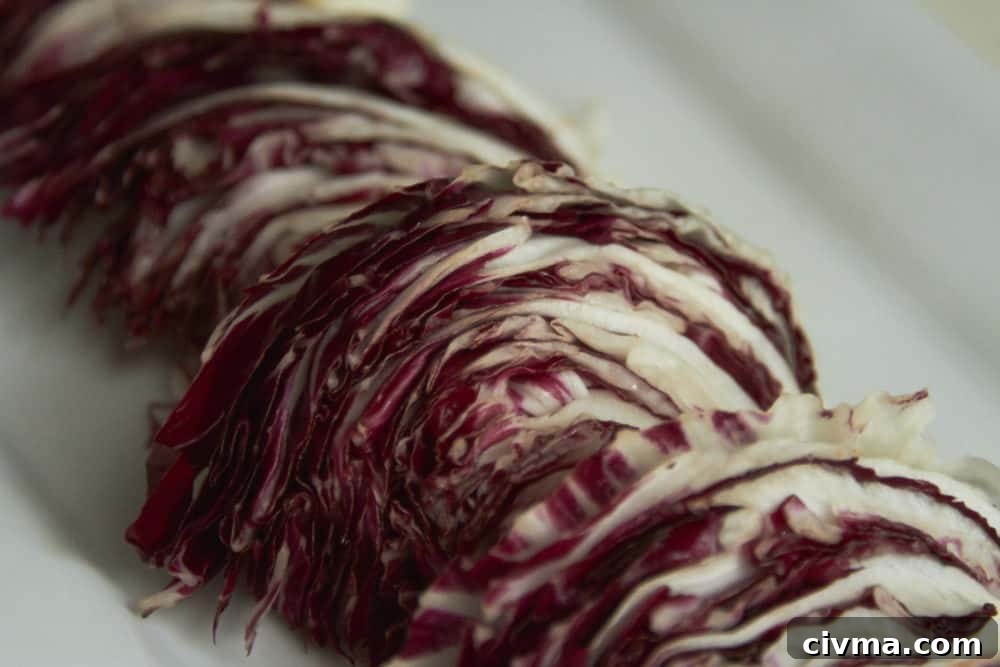 Sliced radicchio on a white plate.