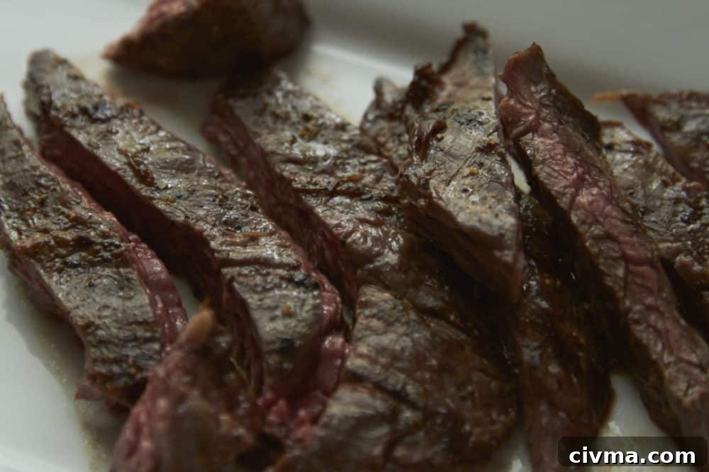 Sliced grilled flank steak.