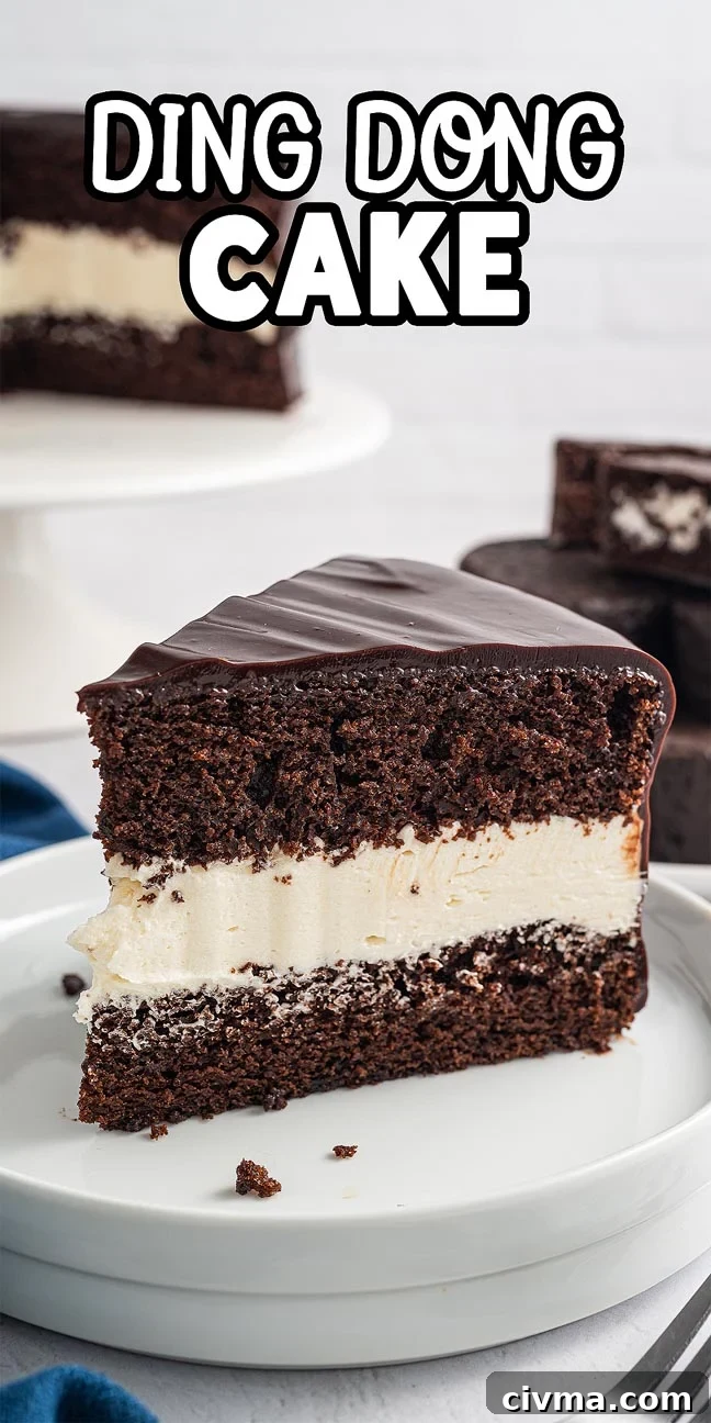 A slice of decadent Ding Dong Cake with creamy filling rests on a white plate, while the whole cake tempts in the background.