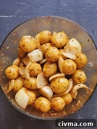 marinated baby potatoes in a glass bowl