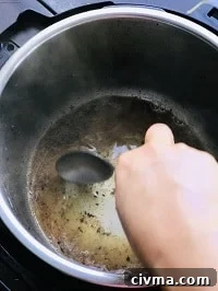 deglazing pot with a steel ladle