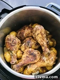 layered potatoes and chicken drumsticks in instant pot