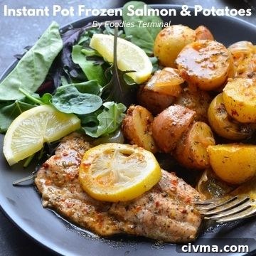 pressure cooked frozen salmon and potatoes served with salad leaves and lemon wedges on a black plate