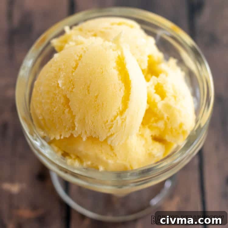 Creamy Mango Coconut Ice Cream Recipe 12 coconut mango ice cream scooped into bowl