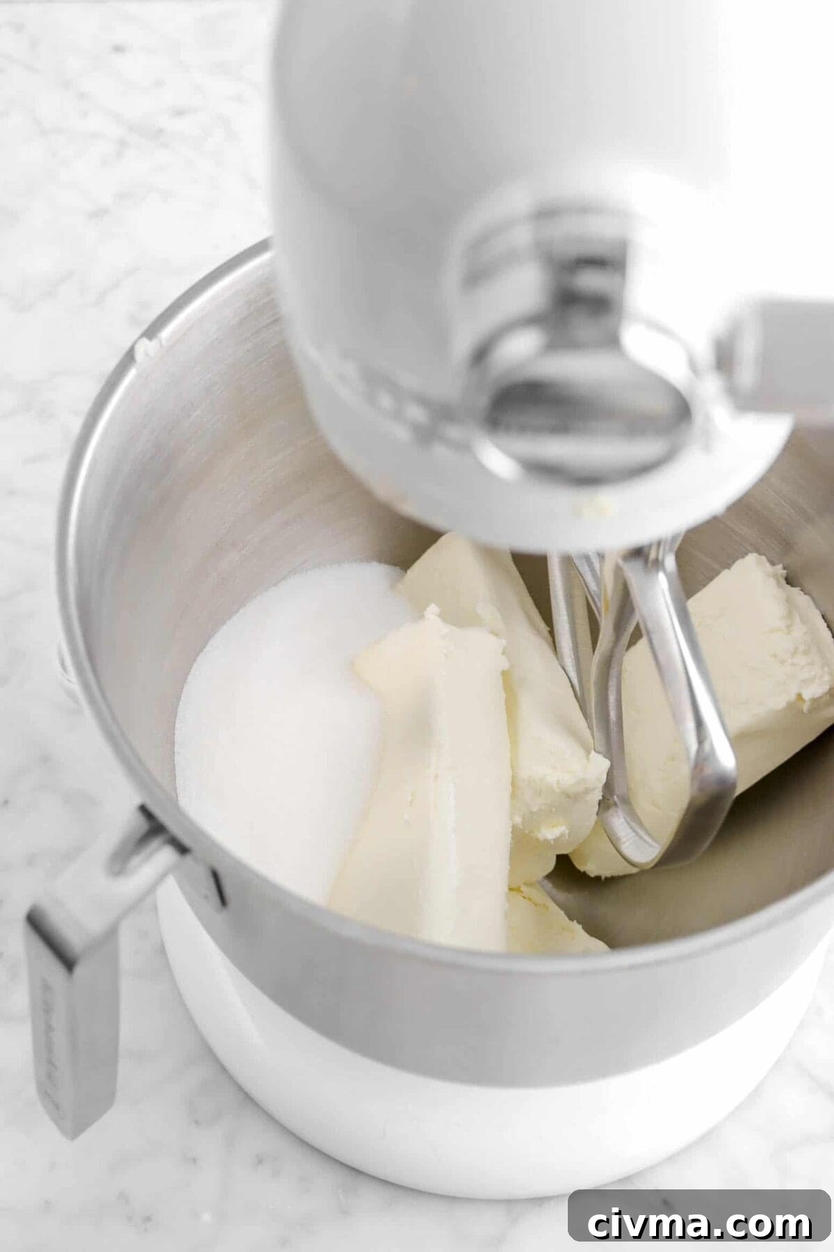 cream cheese and sugar in mixer