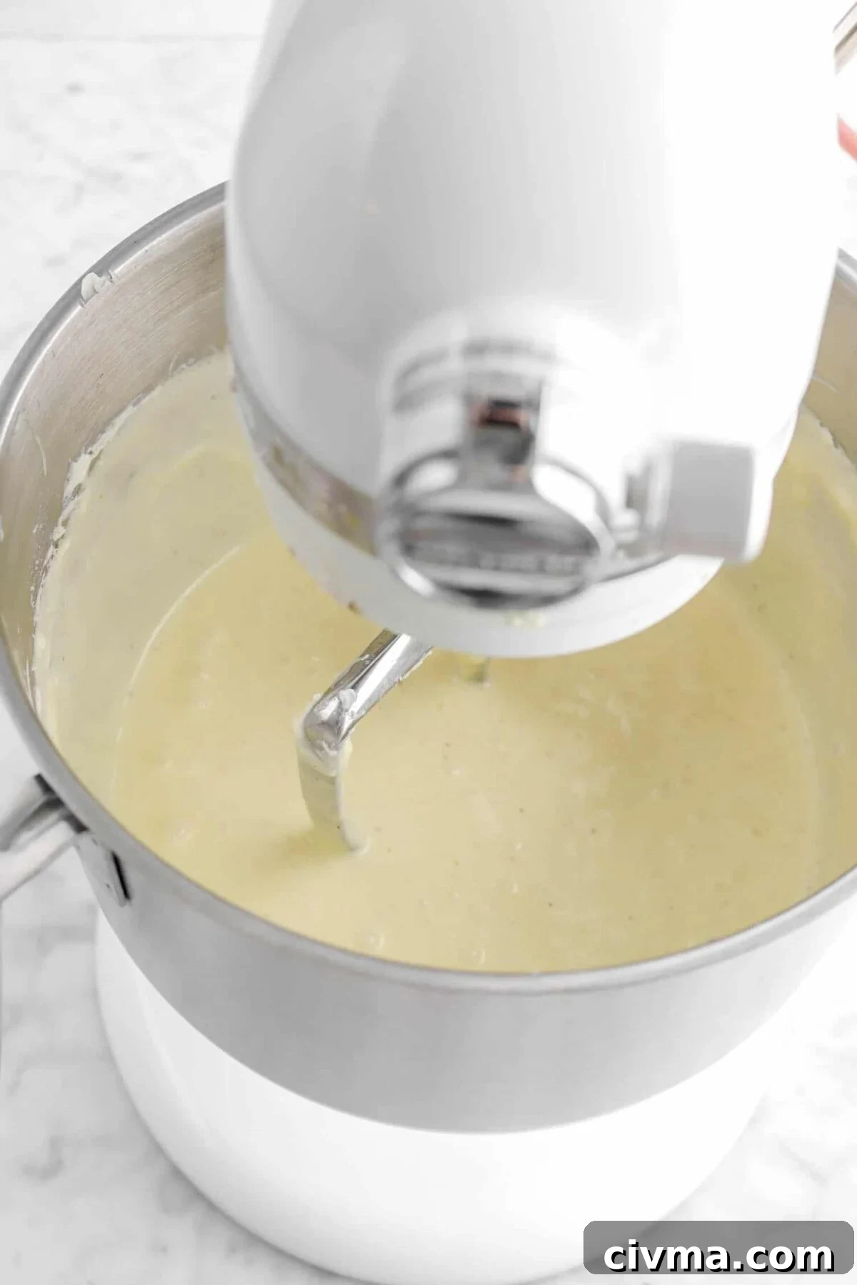 eggnog stirred into cheesecake batter