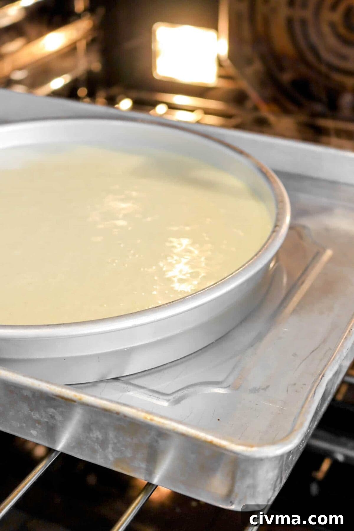 water half way on cheesecake pan